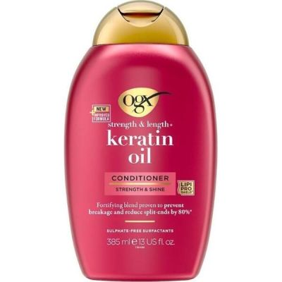 Кондиционер против ломкости OGX с кератиновым маслом 385мл