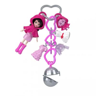 Набір-підвіска Polly Pocket Мінімодниця з нарядами рожева (JKR46/2)
